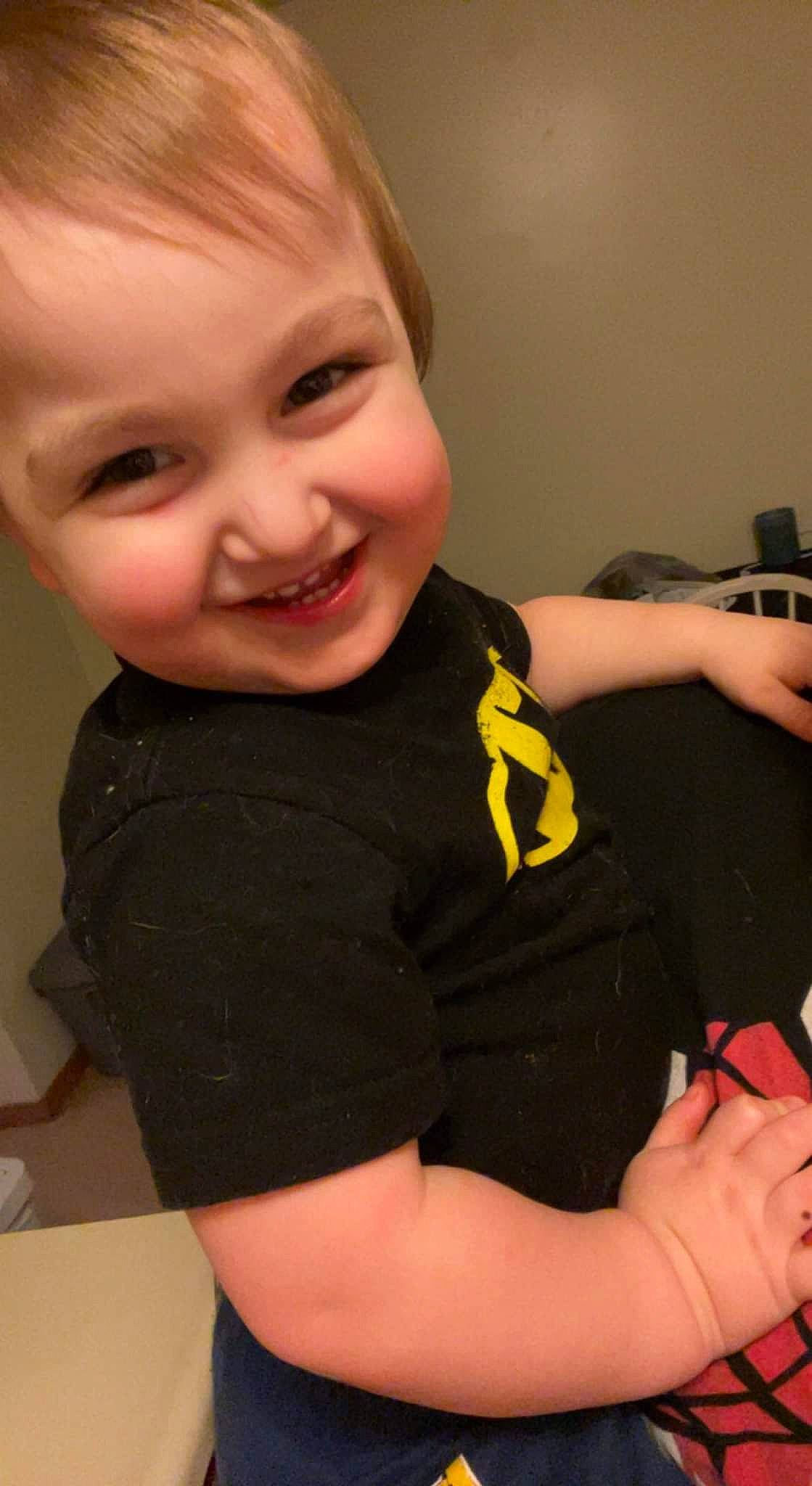 Ethan is registered to the contest to win money with this photo: arm, baby_toddler_clothing, cheek, eyebrow, eyelash, finger, gesture, happy, human_body, iris, joint, joy, lip, mouth, muscle, neck, nose, person, shoulder, skin