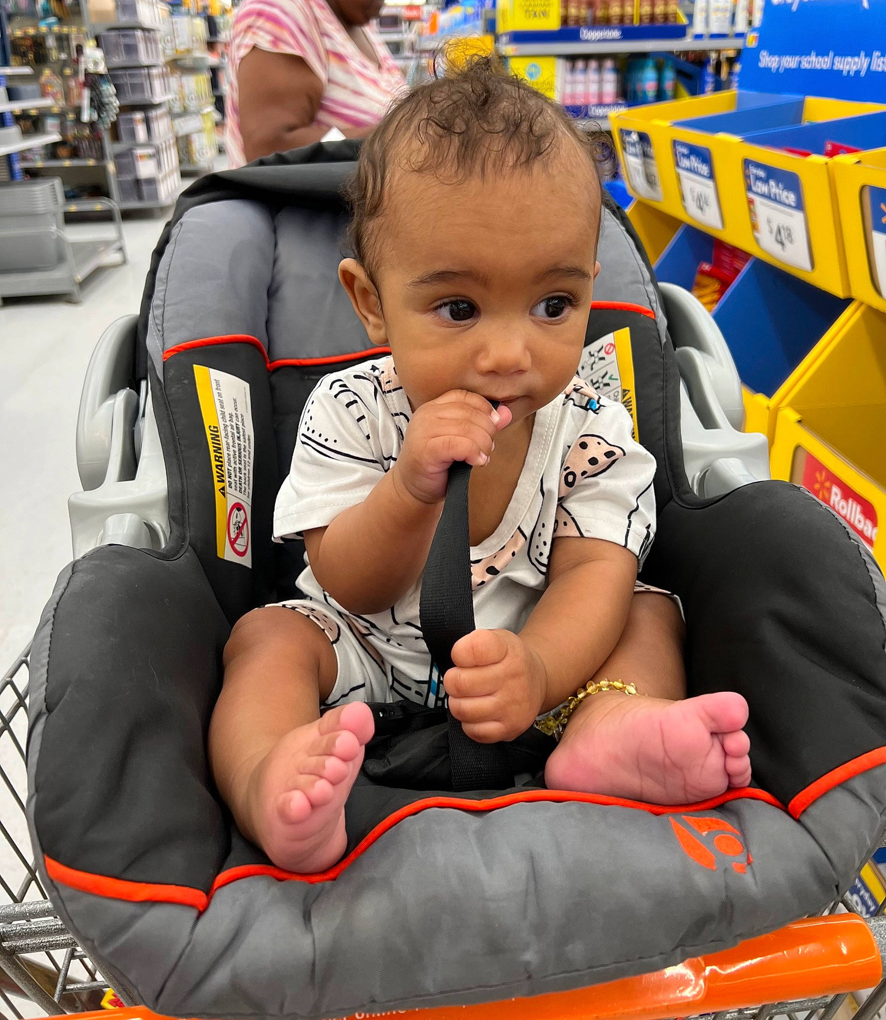 Bellamy is registered to the contest to win money with this photo: baby, baby_carriage, baby_products, bag, child, comfort, customer, event, fun, lap, leisure, luggage_and_bags, person, photograph, play, recreation, retail, shelf, sitting, thigh