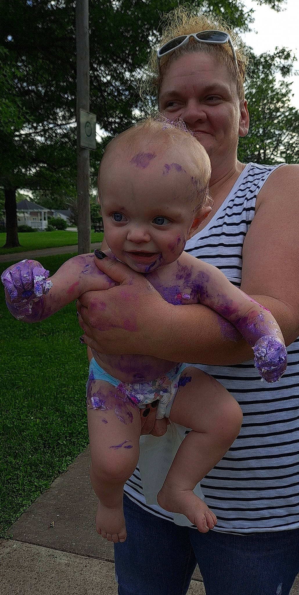 Alaina joined the competition — help win amazing prizes! baby, eye, face, facial_expression, finger, fun, gesture, happy, head, joy, muscle, organ, person, photograph, pink, plant, skin, smile, thigh, toddler