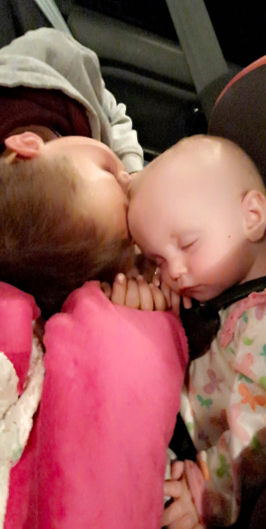 Dayton is registered to the contest to win money with this photo: baby_sleeping, cheek, comfort, eye, eyebrow, eyelash, finger, gesture, glasses, hairstyle, hand, happy, human_body, lip, mammal, mouth, neck, nose, person, pink