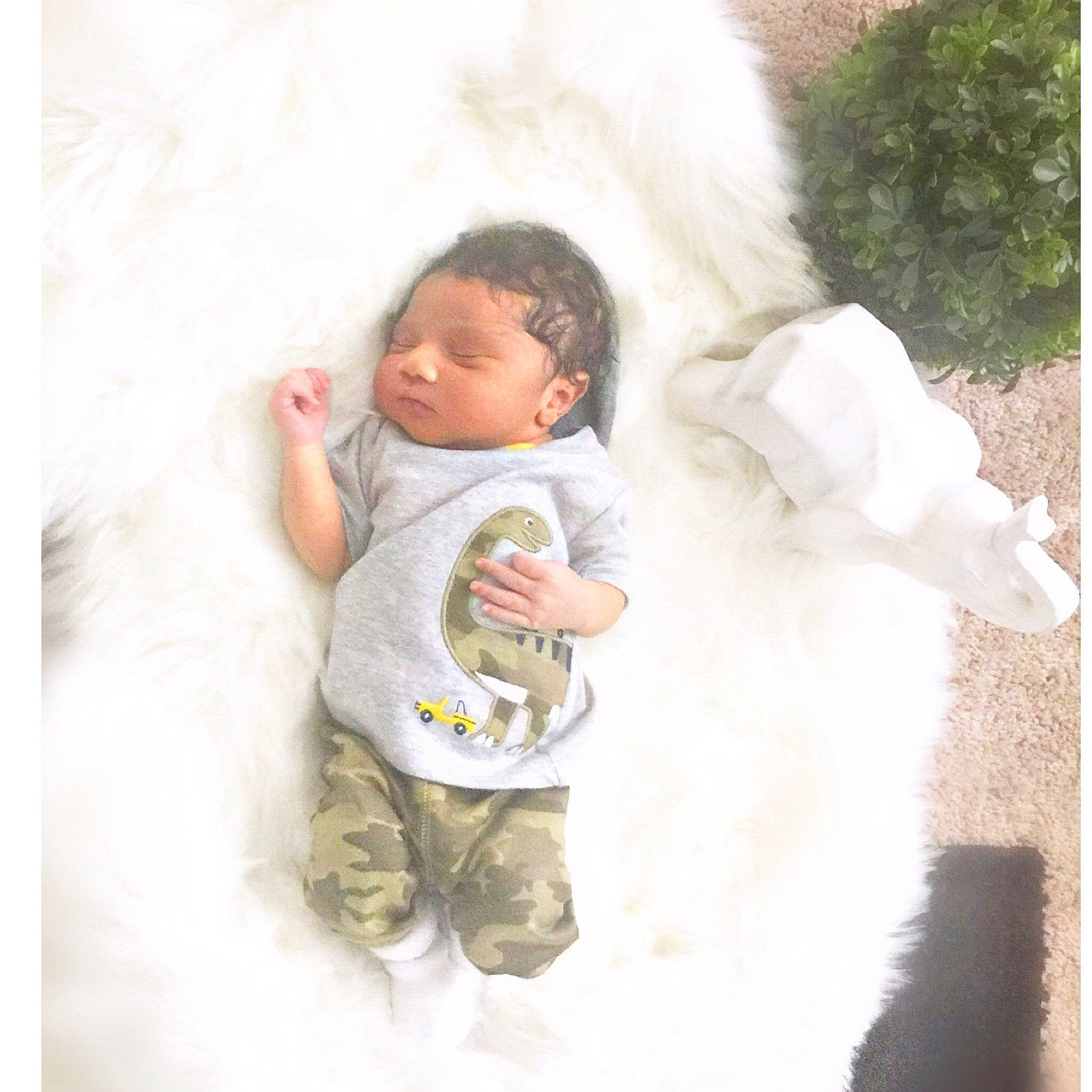 Ashton is registered to the contest to win money with this photo: baby, baby_sleeping, baby_toddler_clothing, child, comfort, face, fun, fur, fur_clothing, happy, linens, nose, person, play, portrait_photography, sitting, sleeve, t_shirt, toddler, winter