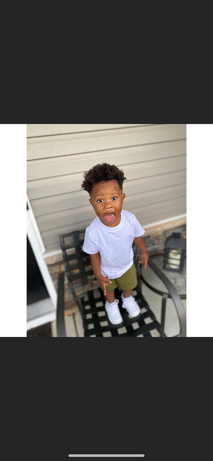 Ashton is registered to the contest to win money with this photo: baby, baby_toddler_clothing, child, flash_photography, happy, human_body, magenta, monochrome_photography, pattern, person, portrait_photography, room, shorts, sitting, sleeve, surprise, t_shirt, toddler