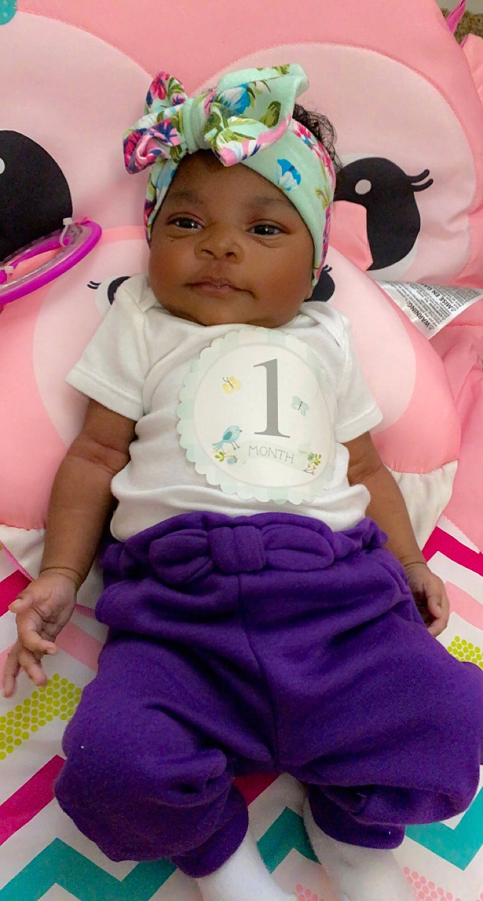 Amora is registered to the contest to win money with this photo: baby, baby_toddler_clothing, baseball_cap, beauty, cap, child, happy, hat, headwear, helmet, magenta, person, pink, purple, sleeve, smile, sun_hat, t_shirt, textile, toddler