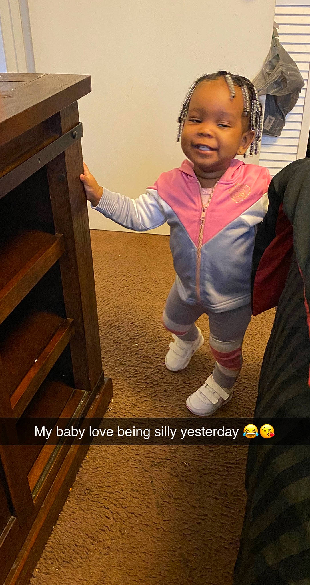 Katelynn is registered to the contest to win money with this photo: baby_toddler_clothing, child, drawer, flooring, fun, gesture, happy, hardwood, jewellery, joy, person, photograph, play, shoe, sitting, skin, sleeve, smile, snapshot, standing