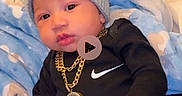 Darrian joined the competition — help win amazing prizes! baby, infant, knitted_hat, bear_ears, mittens, nike, gold_chain, pendant, black_outfit, blanket, blue_blanket, sitting, cute, indoors, cozy, portrait, child, fashion, accessory, soft