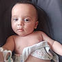Loucas a rejoint le concours — aidez-le/la à gagner de superbes lots ! baby, blanket, child, clothing, comfort, cushion, cute, diaper, expression, face, hand, indoors, infant, pacifier, person, portrait, resting, skin, soft, young