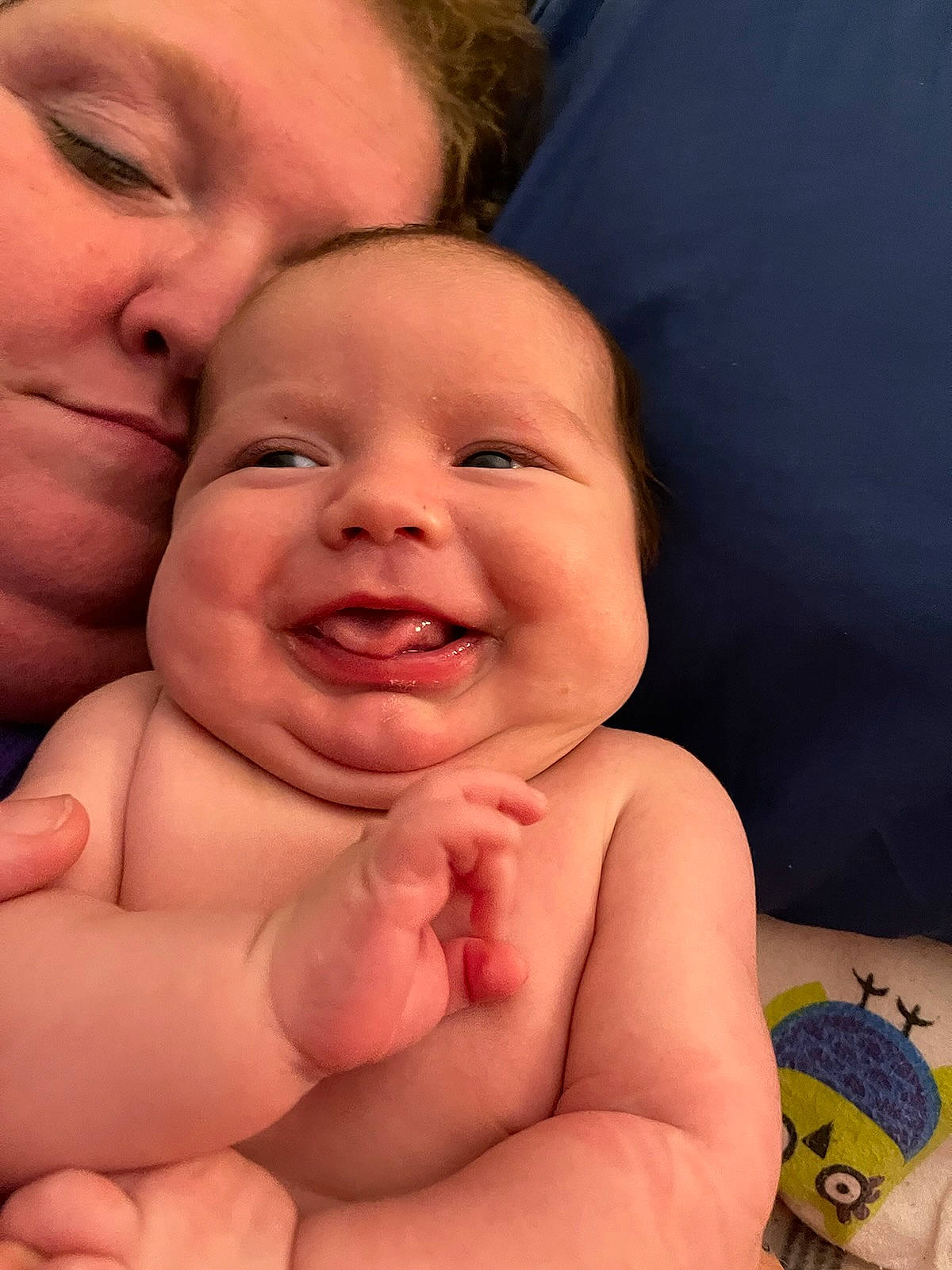 Sterling is registered to the contest to win money with this photo: arm, baby, cheek, chin, eye, eyebrow, face, finger, gesture, happy, head, human_body, iris, joy, lip, mouth, muscle, nose, person, skin