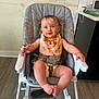 baby, high_chair, messy, food_stains, spaghetti_sauce, bib, diaper, smiling, blue_eyes, kitchen, floor, wall, plastic_chair, child, infant, happy, sitting, indoor, cute, tongue_out