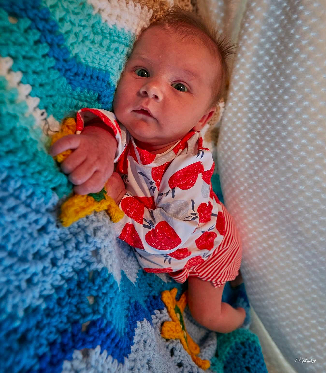 Scarlett joined the competition — help win amazing prizes! baby, baby_products, baby_toddler_clothing, cheek, dress, electric_blue, finger, flooring, fun, happy, iris, linens, lip, mouth, nose, pattern, person, product, skin, sleeve