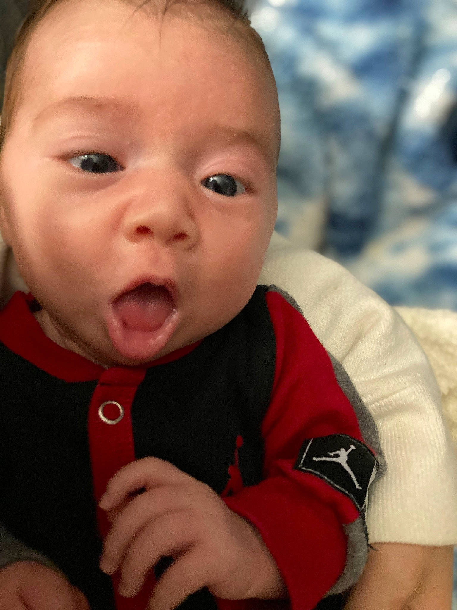 Amiyah is registered to the contest to win money with this photo: baby, baby_toddler_clothing, cheek, chin, close_up, eye, eyelash, face, finger, fun, gesture, happy, iris, lip, mouth, nose, person, skin, sleeve, surprise