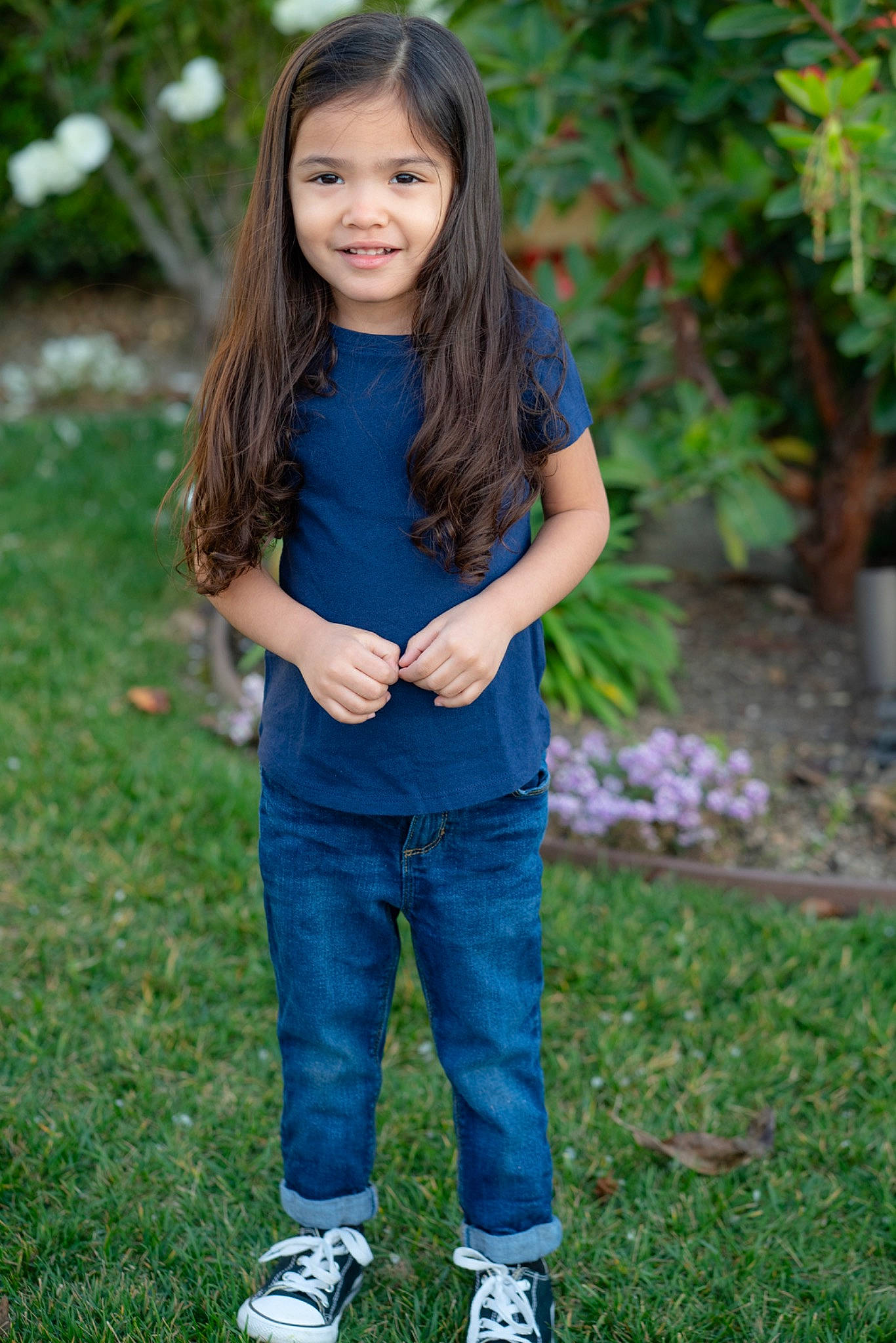 Mya Campos is registered to the contest to win money with this photo: brown_hair, child, child_model, denim, electric_blue, fun, grass, happy, jeans, joy, long_hair, person, photo_shoot, photography, plant, portrait_photography, smile, t_shirt, tree