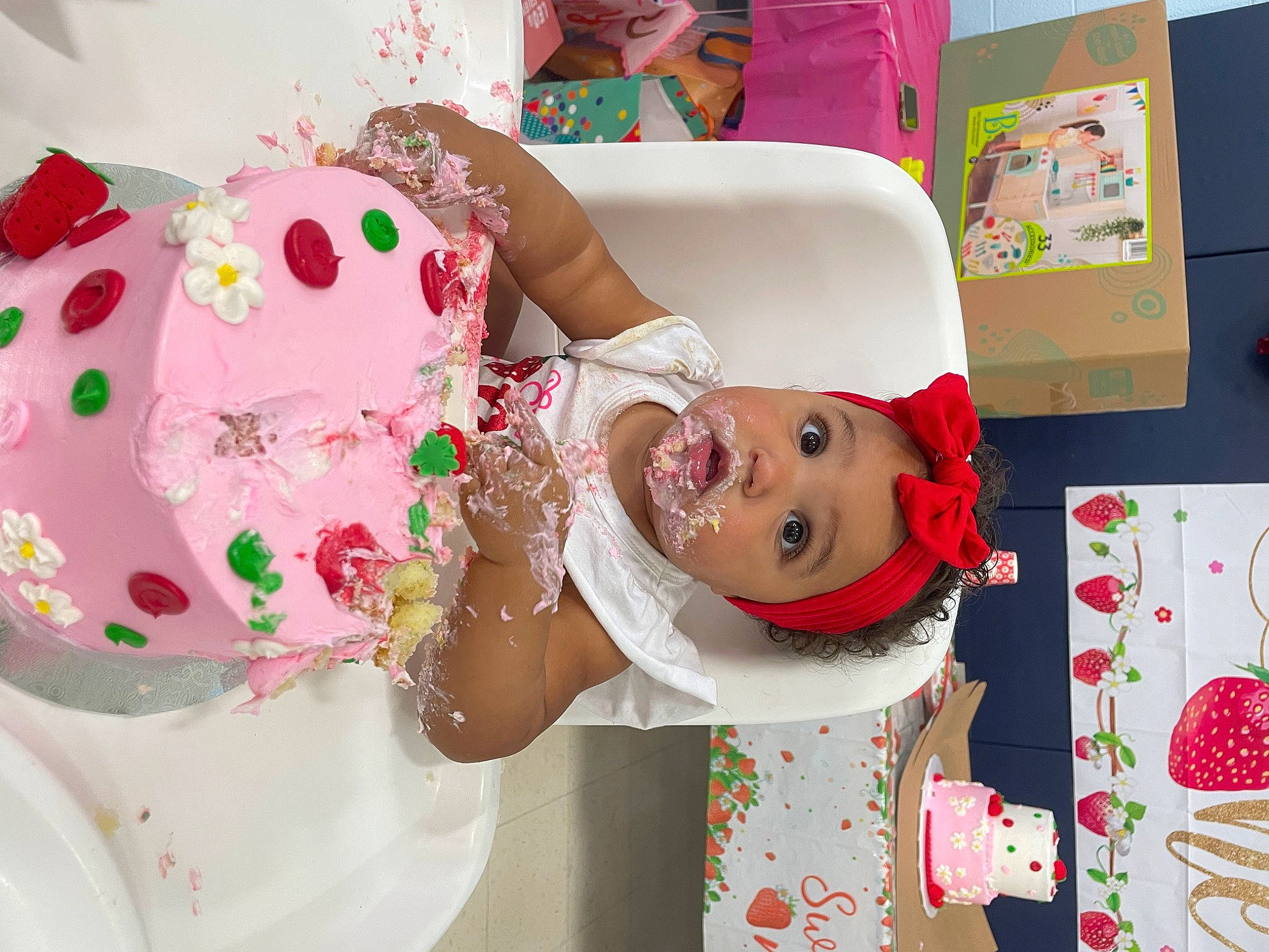 Acelynn is registered to the contest to win money with this photo: art, birthday_cake, cake, cake_decorating, cake_decorating_supply, child, dessert, event, green, happy, headwear, icing, party, party_supply, pattern, person, pink, smile, sugar_cake, surprise