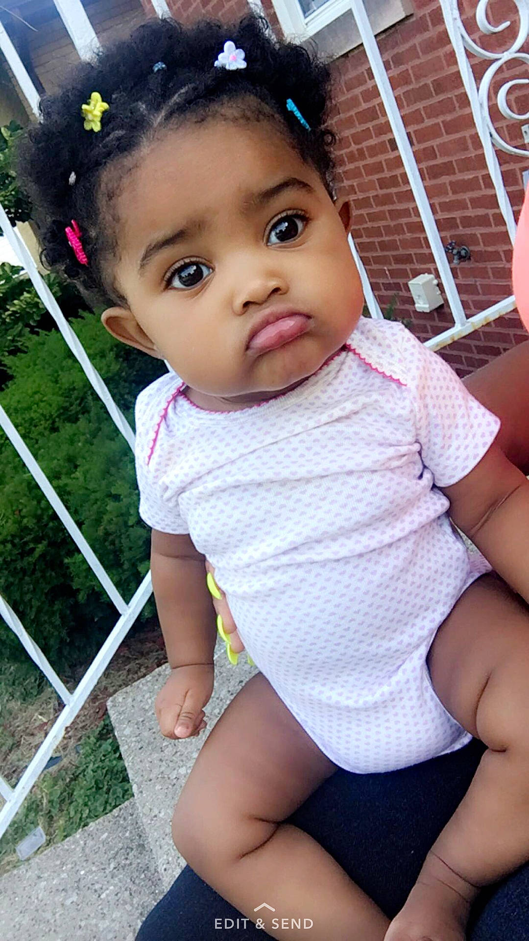 Zuri is registered to the contest to win money with this photo: abdomen, beauty, black_hair, cheek, child, cool, day, eye, girl, human, human_hair_color, infant, leg, person, pink, product, skin, smile, thigh, toddler