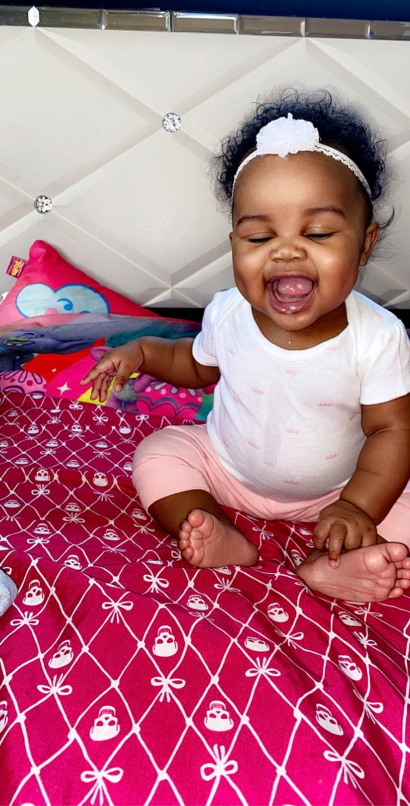 Zylah is registered to the contest to win money with this photo: baby, cheek, child, facial_expression, fun, happy, person, pink, play, skin, smile, textile, toddler