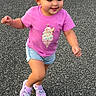 toddler, child, running, pink_tshirt, denim_shorts, sneakers, outdoor, asphalt, happy, joyful, casual_clothing, young_child, playful, smiling, shorts, active, person, summer, daylight, cute