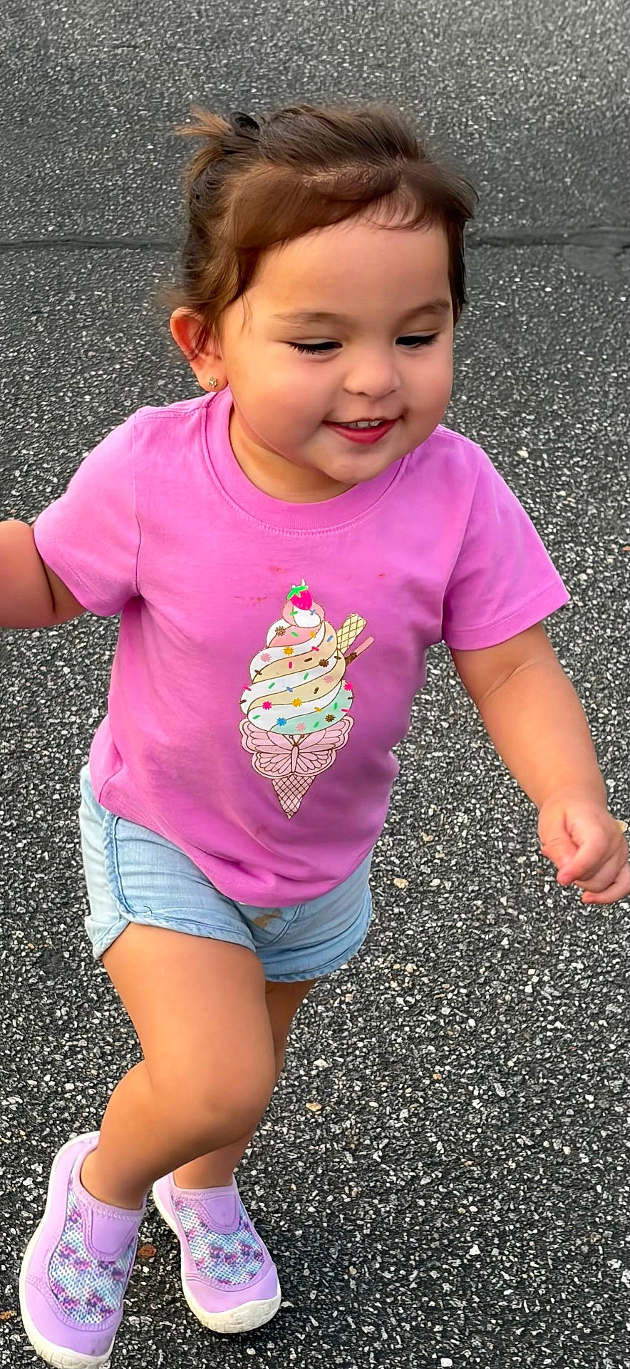 Nathalie joined the competition — help win amazing prizes! active, asphalt, casual_clothing, child, cute, daylight, denim_shorts, happy, outdoor, person, pink_tshirt, playful, portrait, running, shorts, smiling, sneakers, summer_clothing, toddler, young_child
