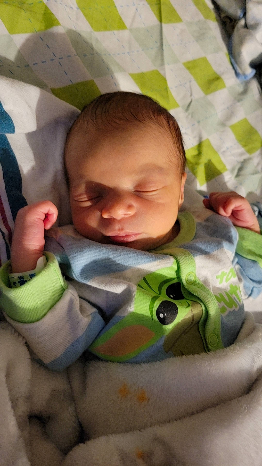 Shaun joined the competition — help win amazing prizes! baby, baby_products, baby_sleeping, baby_toddler_clothing, cheek, child, comfort, facial_expression, finger, gesture, happy, linens, mouth, nose, person, product, sitting, skin, textile, thumb