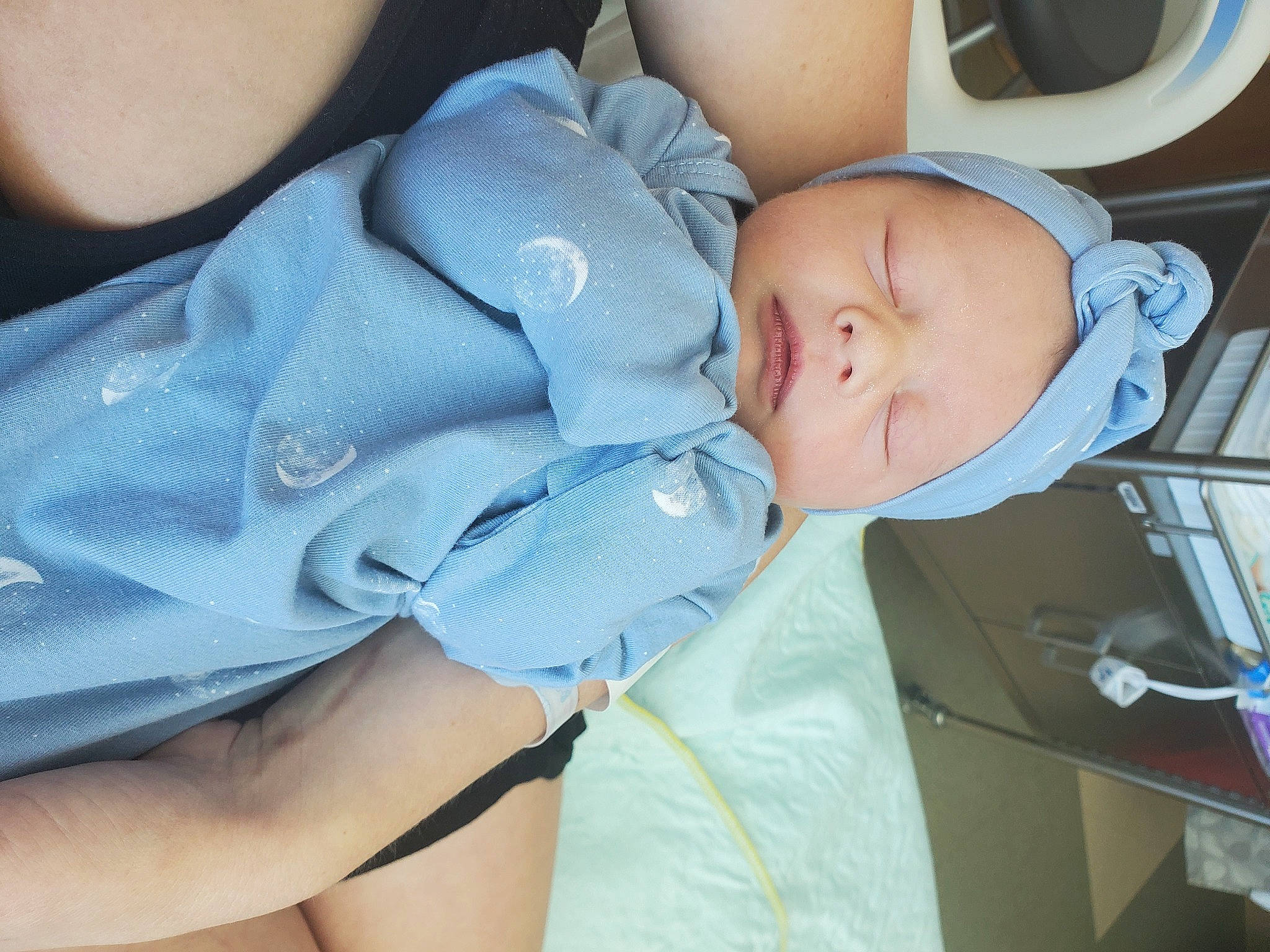 Loki is registered to the contest to win money with this photo: auto_part, baby, baby_carriage, baby_products, baby_toddler_clothing, cheek, child, comfort, electric_blue, finger, hat, human_leg, knee, nail, person, sitting, skin, sleeve, thigh, thumb