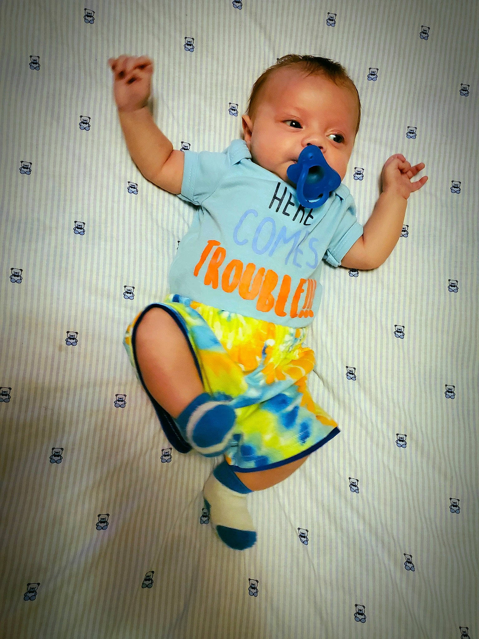 Loki joined the competition — help win amazing prizes! arm, baby, baby_toddler_clothing, child, elbow, electric_blue, flooring, font, fun, happy, leg, linens, pattern, person, shorts, sleeve, sportswear, t_shirt, thigh, thumb