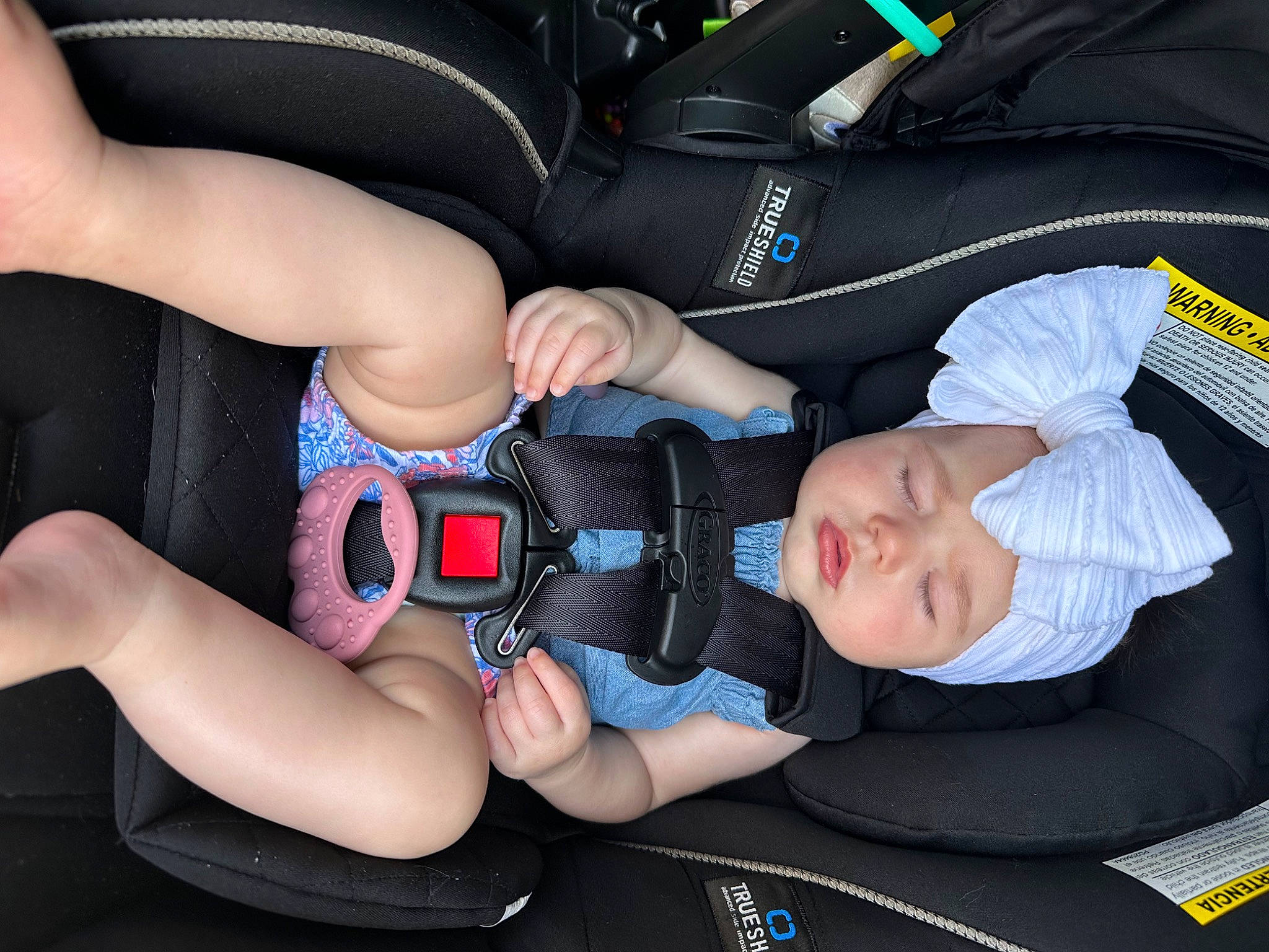Blakely joined the competition — help win amazing prizes! auto_part, automotive_design, baby, baby_products, baby_toddler_clothing, car_seat, child, comfort, electric_blue, finger, gesture, hand, headwear, human_leg, lap, leg, nail, person, thigh, thumb