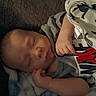 Liam joined the competition — help win amazing prizes! baby, babywear, blanket, child, clothing, cozy, cute, face, hand, indoor, infant, newborn, onesie, peaceful, person, portrait, relaxation, resting, sleeping, soft