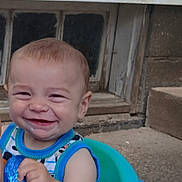 Liam joined the competition — help win amazing prizes! baby, blue, child, clothing, concrete, cute, face, happy, heart, infant, outdoor, person, playful, seat, sleeveless, smile, steps, toy, window, young