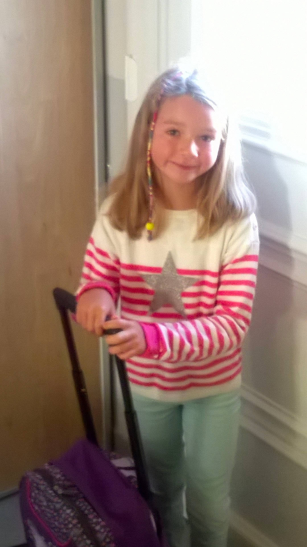 Tya participe au concours pour gagner de l'argent avec cette photo : beauty, blond, child, clothing, day, fun, girl, hair, hairstyle, human_hair_color, person, pink, product, purple, shoulder, sitting, skin, standing, textile, toddler