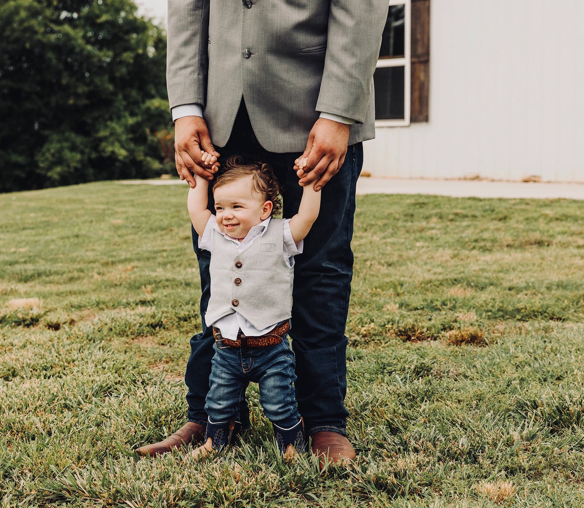 Waylon joined the competition — help win amazing prizes! dress, facial_expression, flash_photography, fun, gesture, grass, grassland, happy, holding_hands, jeans, joy, landscape, lawn, meadow, people_in_nature, person, plant, smile, standing, toddler