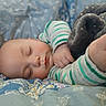 Vincent is registered to the contest to win money with this photo: baby, bedding, blanket, cheek, closeup, cozy, cute, eyelashes, face, hand, infant, nursery, pajamas, peaceful, plush_blanket, portrait, resting, sleeping, soft_texture, striped_clothing