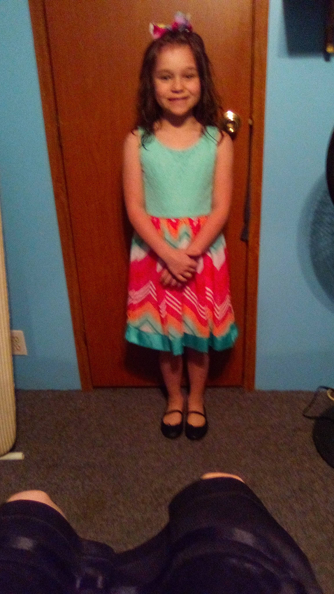 Zendaya is registered to the contest to win money with this photo: baby_toddler_clothing, child, design, dress, flooring, fun, hairstyle, happy, head, human_leg, joy, knee, magenta, pattern, person, sleeve, smile, standing, thigh, toddler