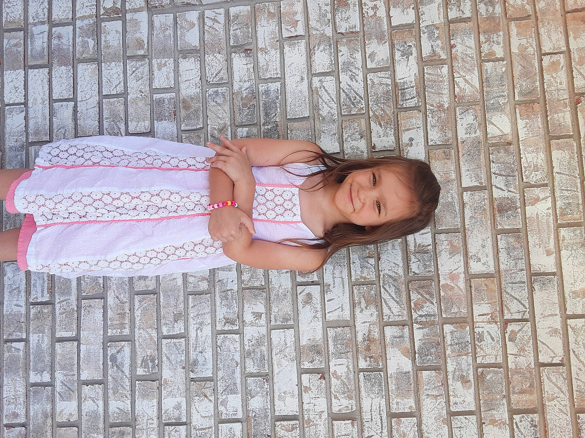 Zendaya is registered to the contest to win money with this photo: baby, baby_products, baby_toddler_clothing, child, comfort, flooring, foot, happy, hardwood, human_body, human_leg, joy, leg, linens, pattern, person, sitting, skin, textile, toddler