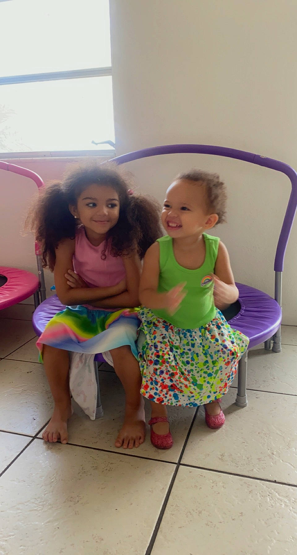 Rilynn is registered to the contest to win money with this photo: chair, child, event, floor, flooring, foot, fun, happy, human_leg, joy, leg, leisure, person, pink, sandal, sitting, skin, smile, t_shirt, thigh