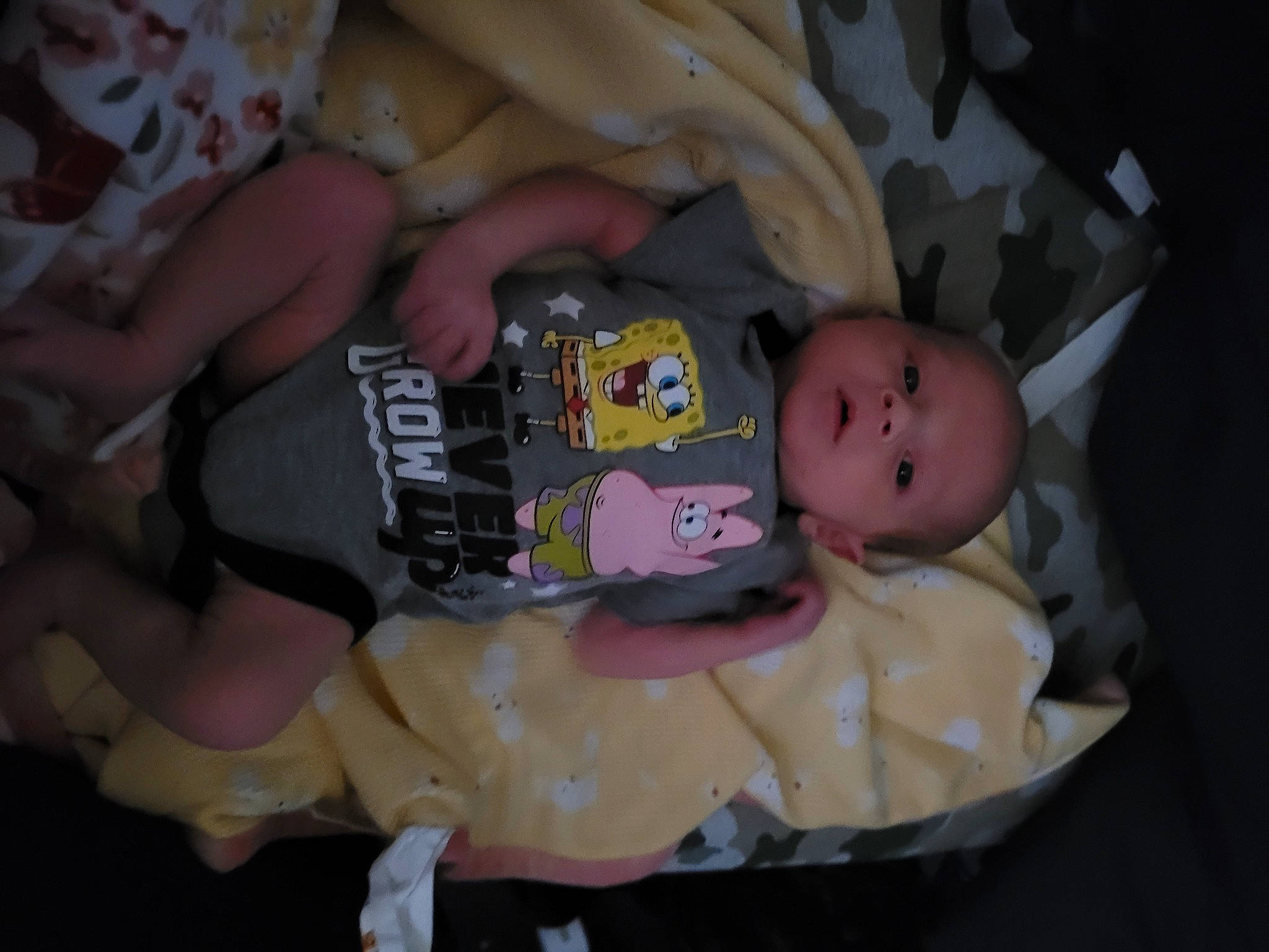 Kamilah is registered to the contest to win money with this photo: abdomen, baby, baby_products, baby_toddler_clothing, bedtime, cheek, chest, child, comfort, eye, head, human_body, lap, mouth, person, room, sitting, thigh, toddler, toy