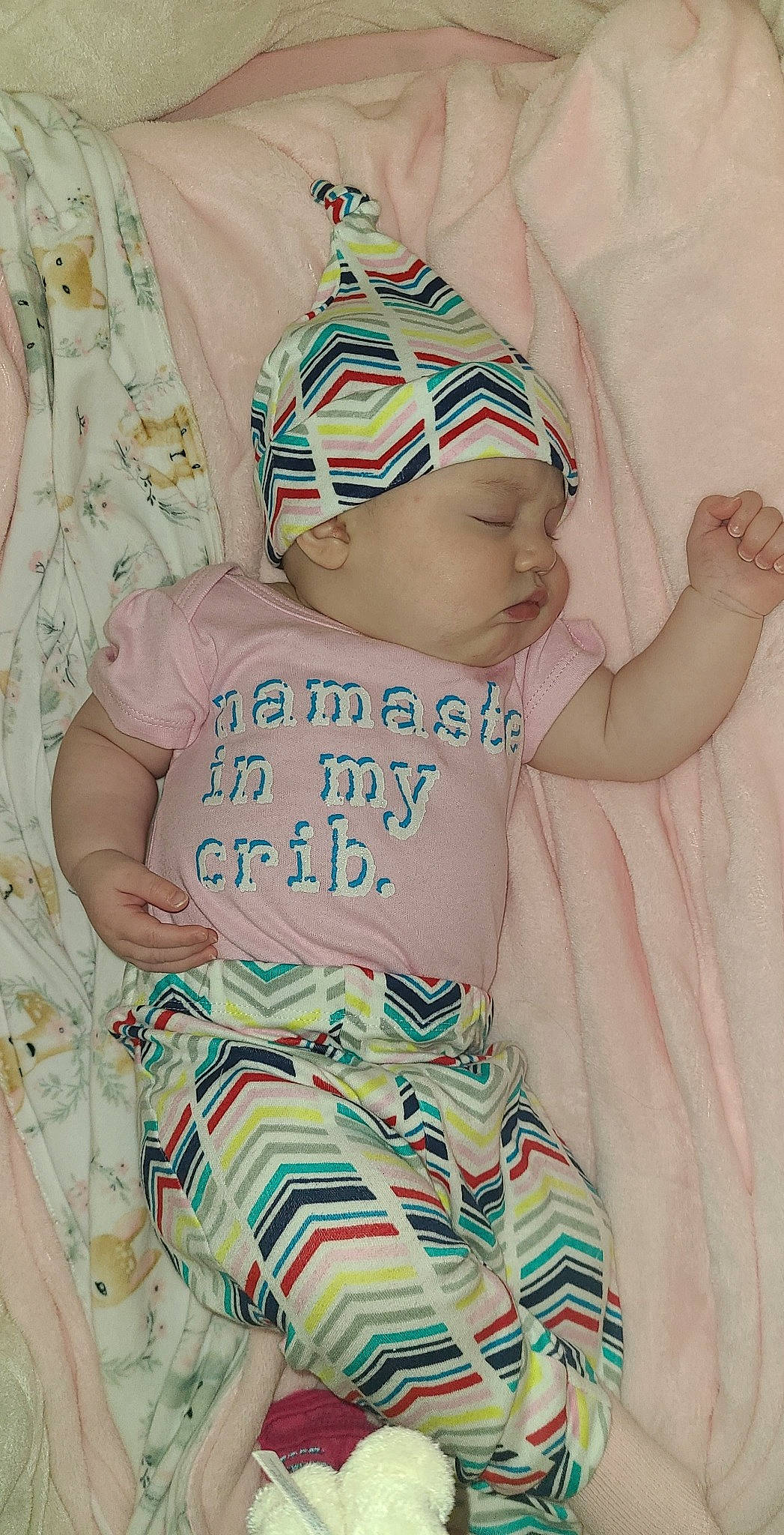 Ava Genevieve is registered to the contest to win money with this photo: baby, baby_sleeping, baby_toddler_clothing, cap, cheek, comfort, cool, eye, face, facial_expression, hat, head, headgear, headwear, human_body, neck, person, pink, skin, sleeve