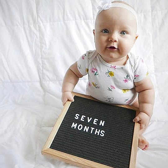 Claire is registered to the contest to win money with this photo: baby, baby_products, baby_toddler_clothing, child, happy, person, photography, product, smile, t_shirt, toddler