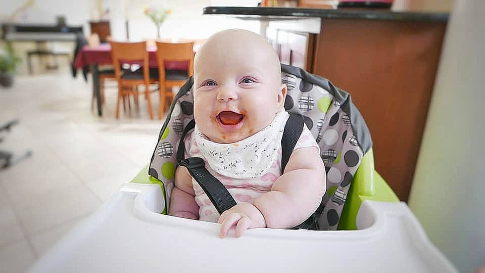 Claire joined the competition — help win amazing prizes! baby, baby_carriage, baby_products, bib, cheek, child, person, product, sitting, skin, smile, toddler