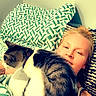 animal, bed, blanket, casual, cat, closeup, comfort, feline, home, indoor, light, pattern, person, pet, pillow, relaxation, resting, sleepy, striped_pillow, white_shirt