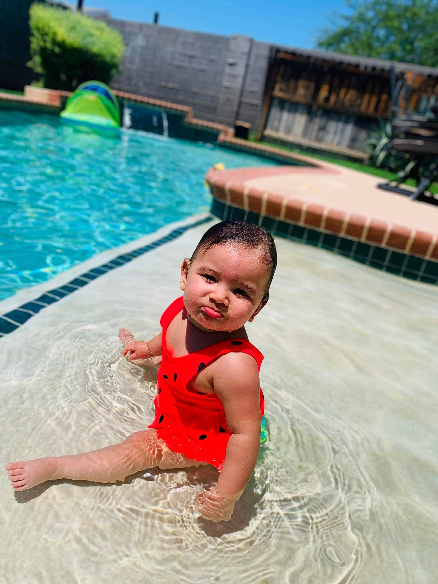 Serenity joined the competition — help win amazing prizes! aqua, baby, bathing, blue, body_of_water, child, fun, green, happy, leisure, person, play, recreation, sky, smile, summer, swimming_pool, toddler, tree, vacation