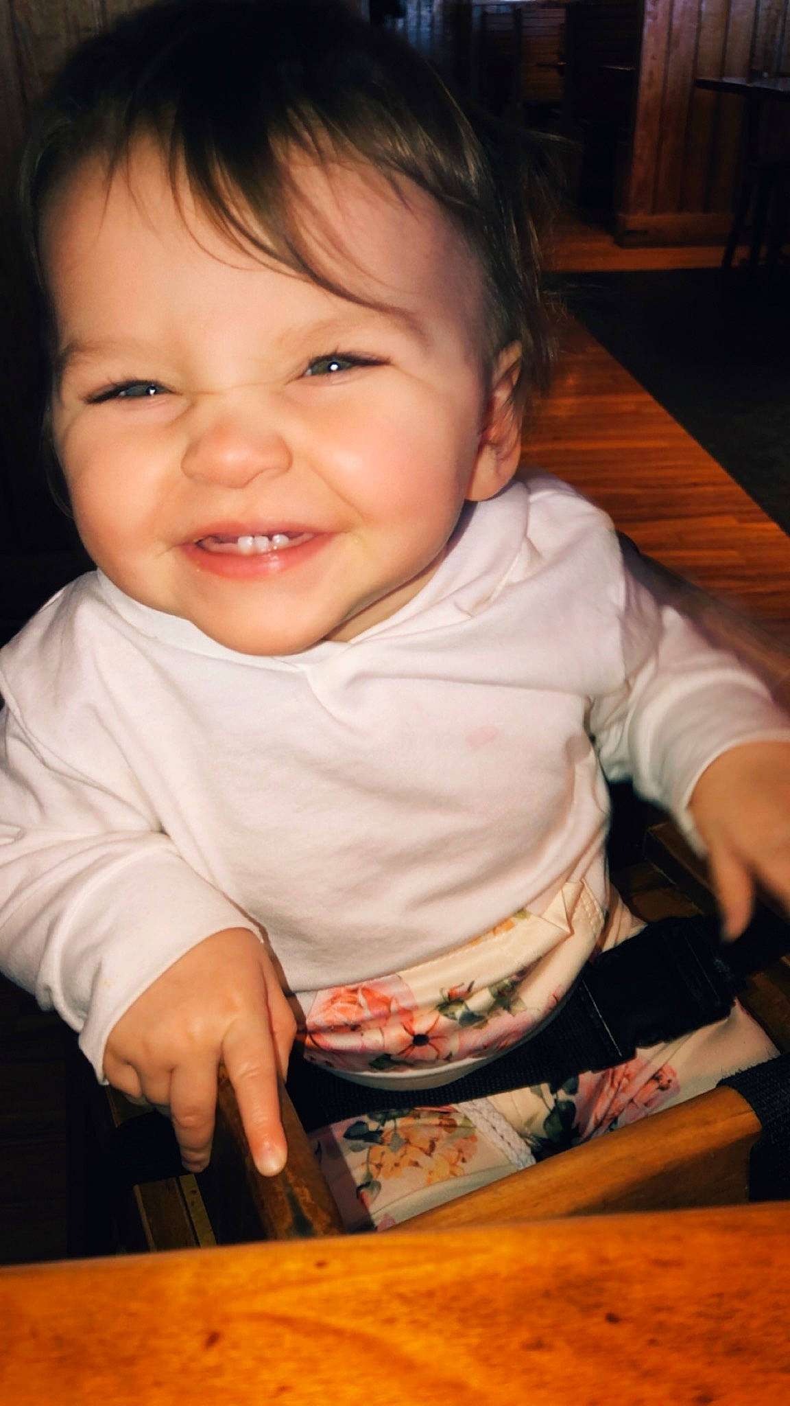 Teigan is registered to the contest to win money with this photo: baby, beauty, cheek, child, chin, eye, face, facial_expression, fun, head, joy, nose, person, play, sitting, skin, smile, toddler, wood
