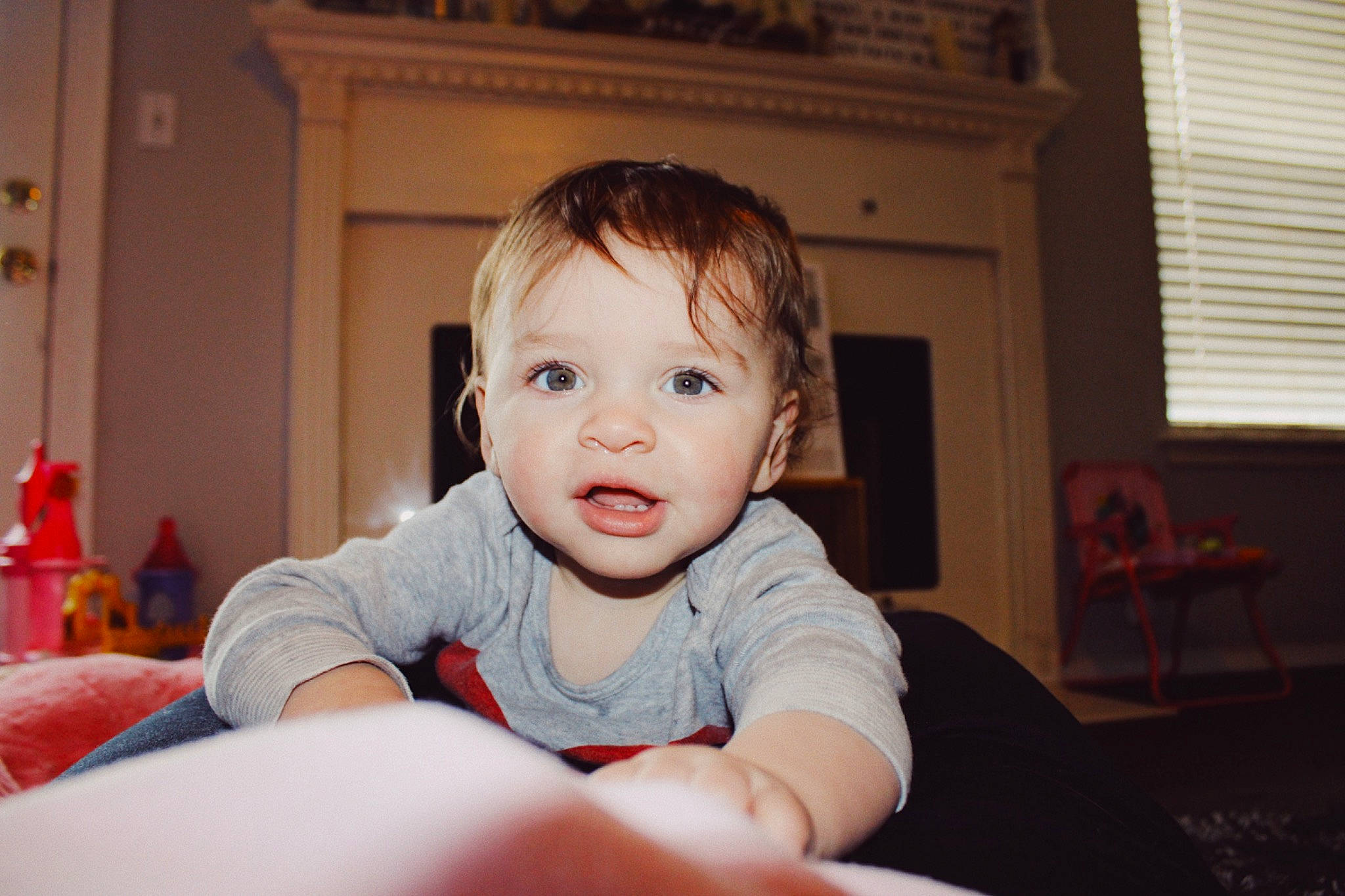 Teigan is registered to the contest to win money with this photo: baby, cheek, child, chin, ear, eye, face, fun, head, nose, person, room, sitting, skin, smile, toddler, tummy_time, vacation