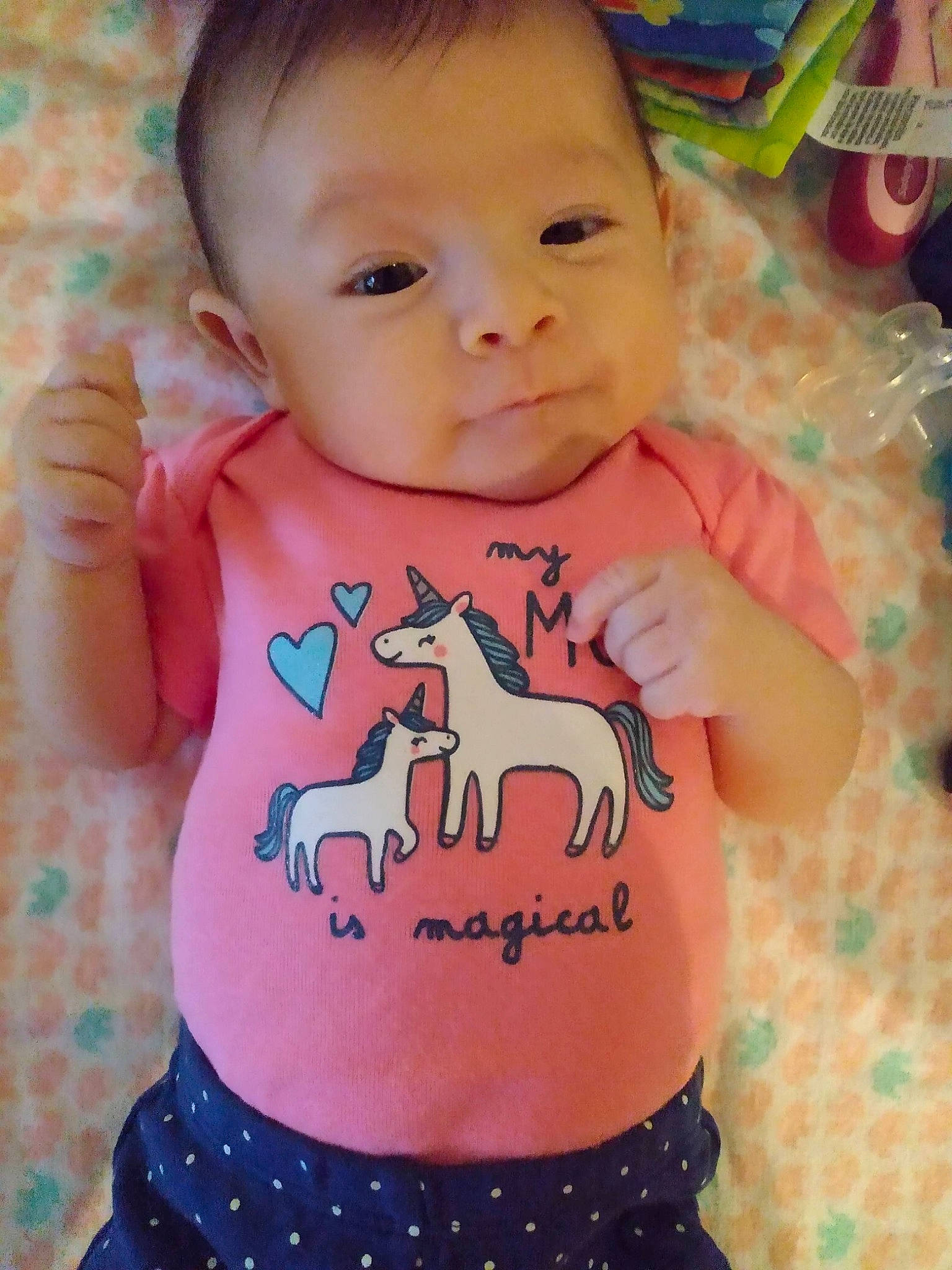 Ainsley joined the competition — help win amazing prizes! arm, baby_toddler_clothing, cheek, clothing, hand, happy, head, human_body, joint, neck, organ, person, pink, product, shoulder, skin, sleeve, t_shirt, textile, vertebrate