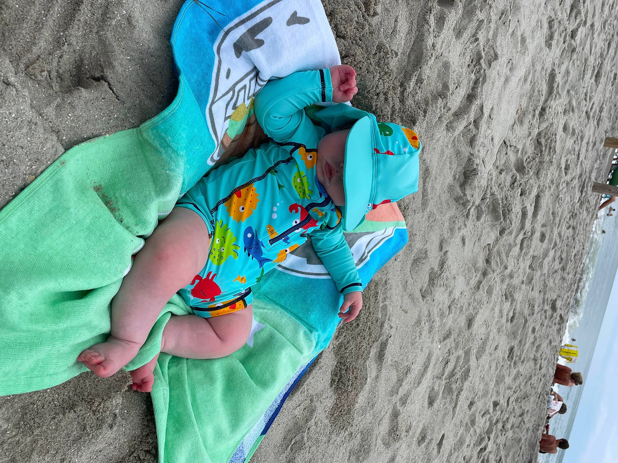 Liam joined the competition — help win amazing prizes! adventure, azure, baby, baby_products, baby_toddler_clothing, child, concrete, electric_blue, hand, leisure, linens, person, play, recreation, rock, sand, sleeve, slope, t_shirt, toddler