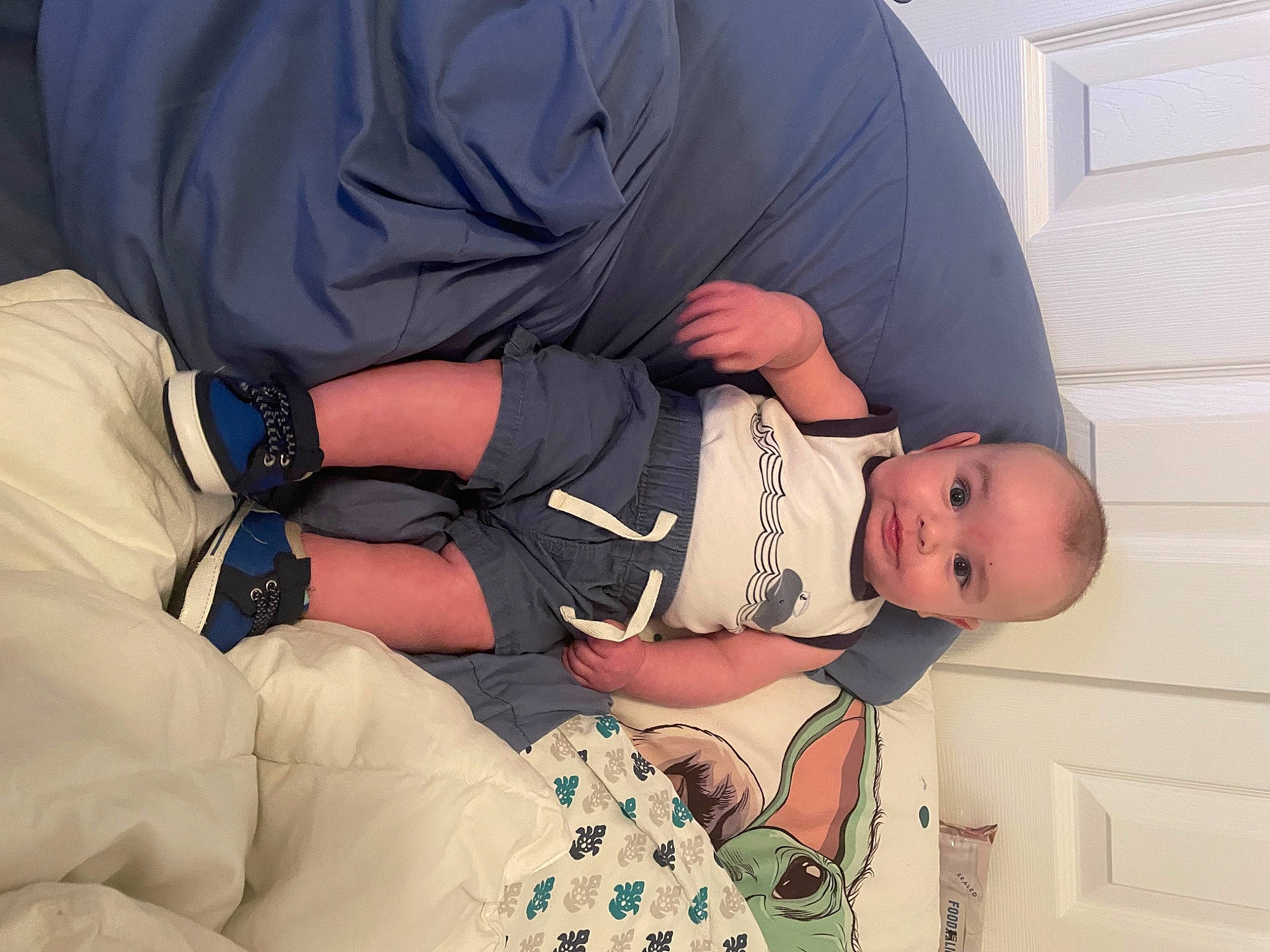 Liam is registered to the contest to win money with this photo: abdomen, baby, baby_toddler_clothing, child, comfort, elbow, finger, hand, human_body, joint, knee, lap, person, shoulder, sitting, sleeve, stomach, thigh, toddler, trunk