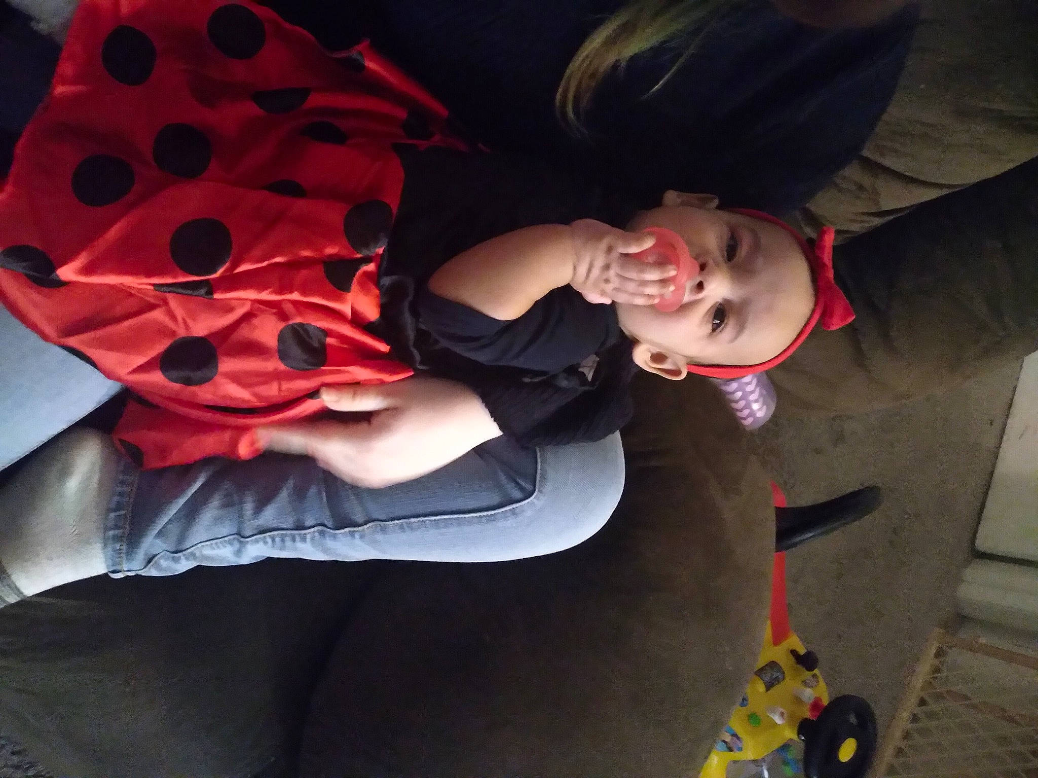 Sophia is registered to the contest to win money with this photo: auto_part, carmine, costume, event, eyewear, fashion_accessory, fictional_character, finger, flesh, fun, hat, headgear, human_leg, mouth, person, petal, room, suit, sunglasses, thigh