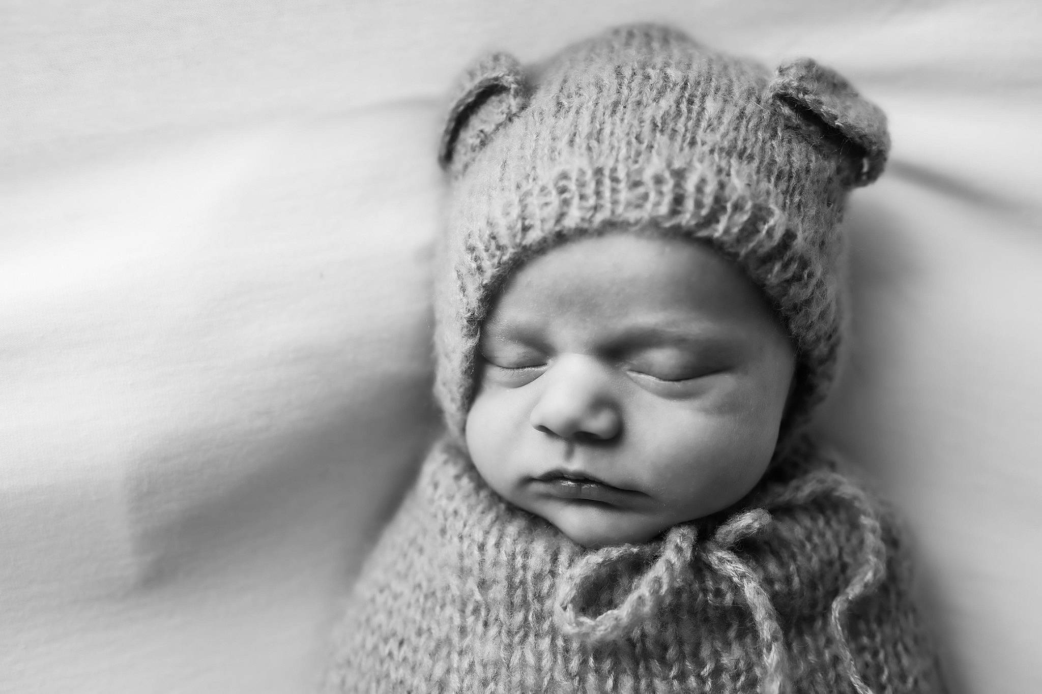 Chance joined the competition — help win amazing prizes! baby, baby_toddler_clothing, cap, comfort, eye, face, fashion_accessory, flash_photography, fur, grey, head, headwear, knit_cap, lip, monochrome_photography, nose, outerwear, person, sleeve, toddler
