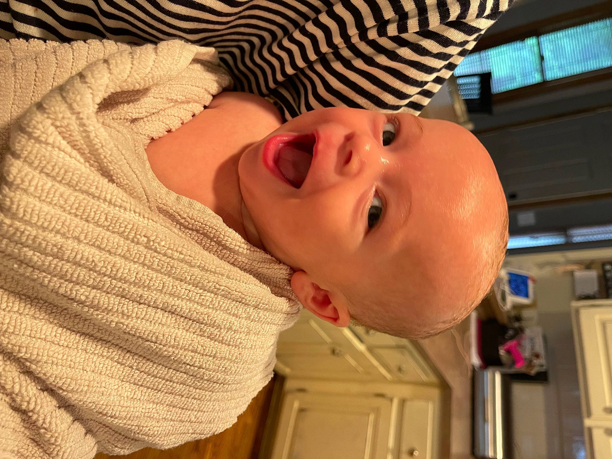 Atticus is registered to the contest to win money with this photo: baby, baby_toddler_clothing, cheek, child, countertop, eyebrow, eyelash, happy, hat, headgear, home_appliance, iris, kitchen_appliance, lip, mouth, nose, person, smile, sun_hat, toddler