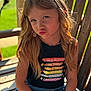 child, girl, blonde_hair, outdoor, bench, wooden_bench, sunlight, pucker_lips, casual_clothing, necklace, colorful, smiling, portrait, cute, playful, summer, daylight, young, happy, fashion