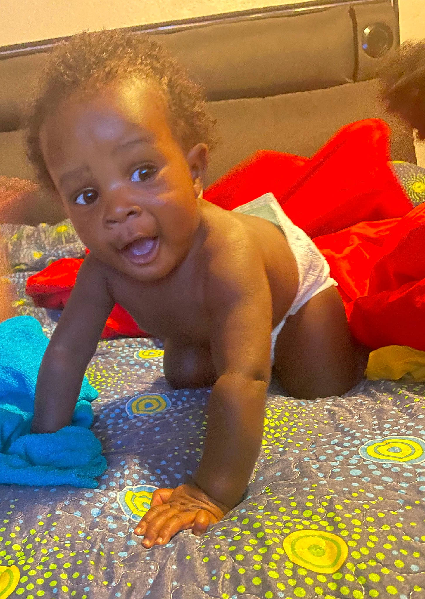 Jrue joined the competition — help win amazing prizes! baby, barechested, barefoot, chest, child, comfort, flooring, fun, happy, human_leg, leisure, linens, mouth, orange, pattern, person, sitting, smile, summer, toddler