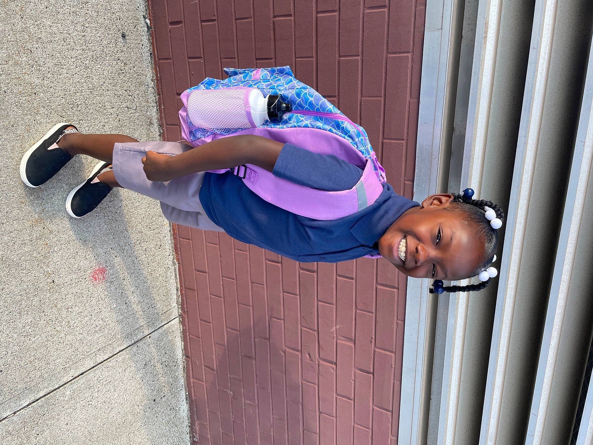 Apryl is registered to the contest to win money with this photo: child, concrete, elbow, electric_blue, fun, happy, hat, human_leg, joy, knee, leisure, magenta, person, pink, purple, smile, t_shirt, thigh, waist, walking_shoe