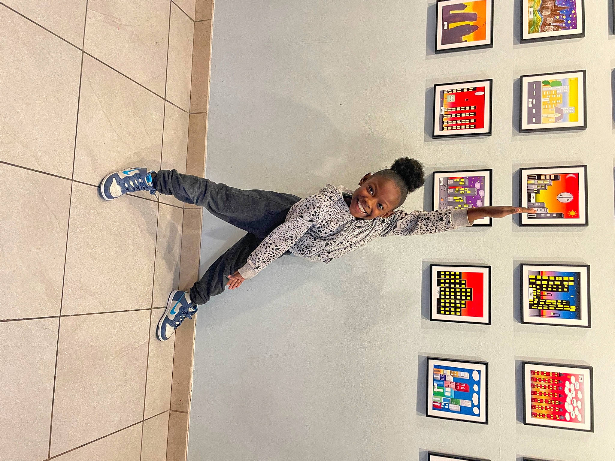 Apryl is registered to the contest to win money with this photo: art, concrete, fashion_design, font, fun, human_leg, joy, knee, pattern, person, picture_frame, recreation, rectangle, room, visual_arts, walking_shoe